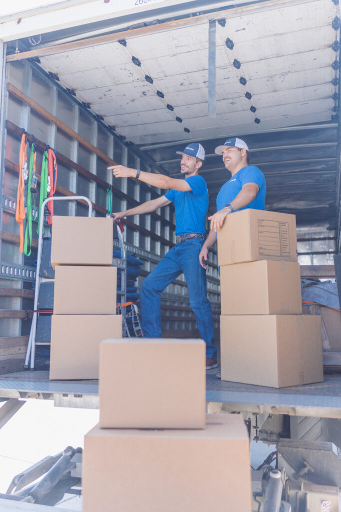 Commercial movers loading truck