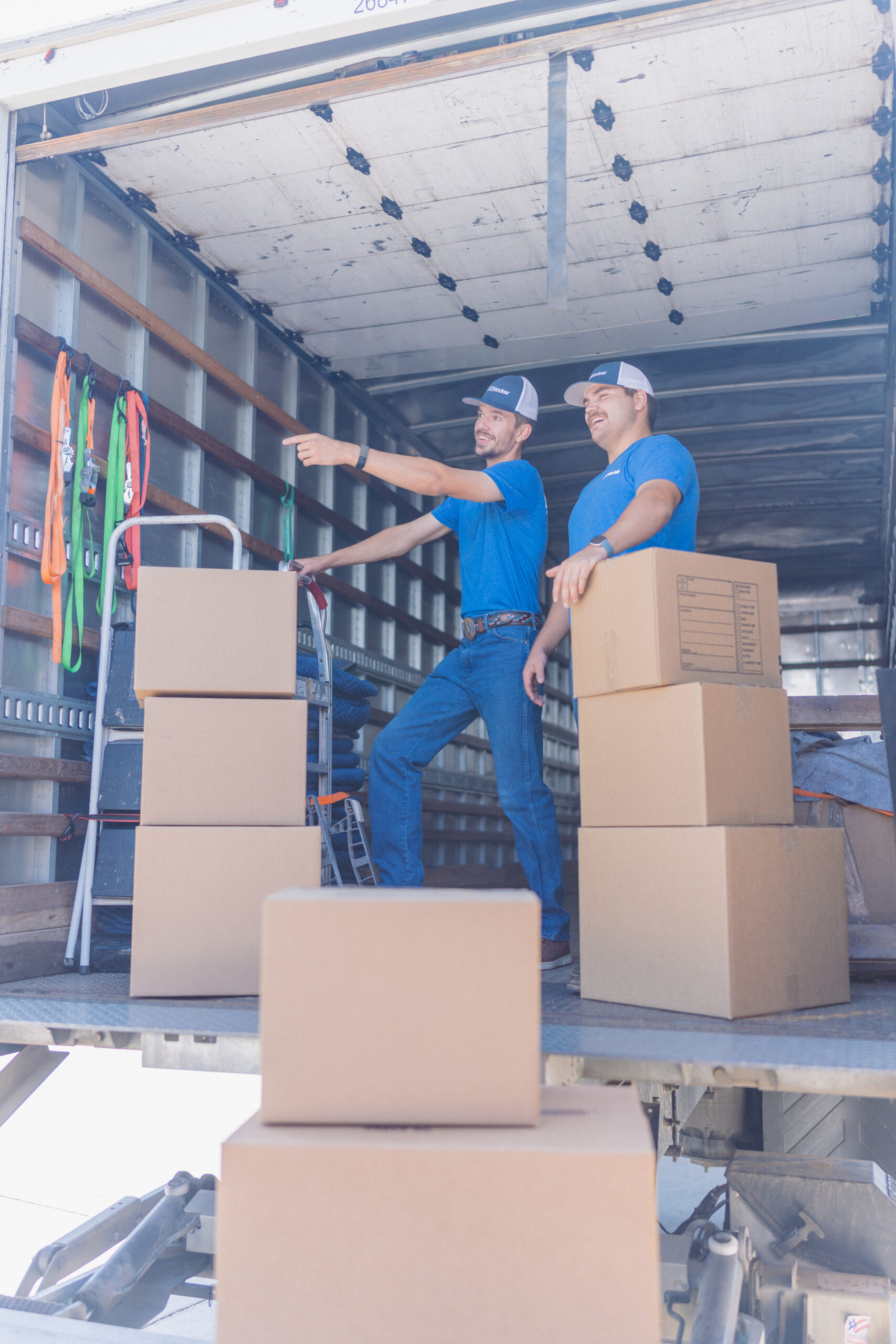 Commercial movers loading truck